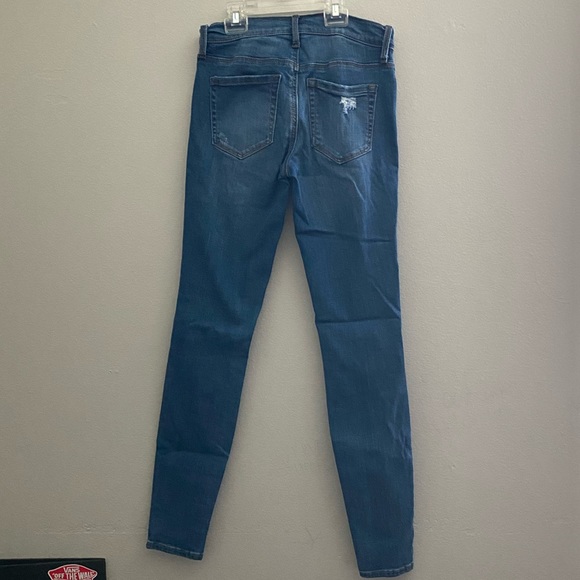 These are low rise, ripped jeans - Picture 2 of 4